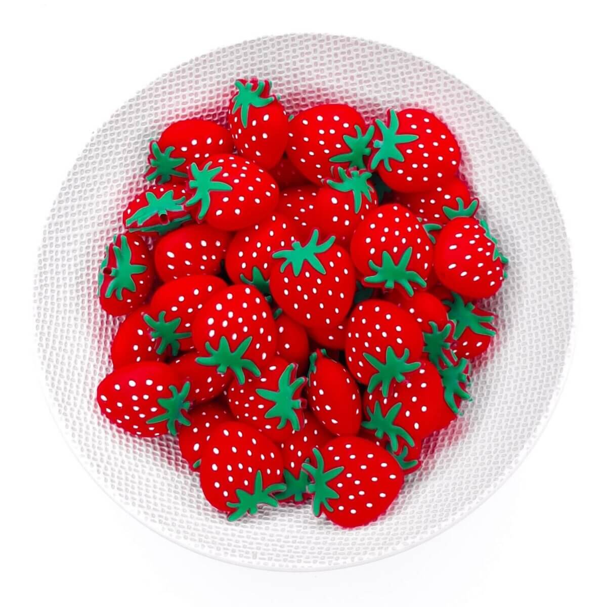 Kleurcode: Rood - Type: Siliconen kralen aardbei - Formaat: 24 mm x 25 mm - Verkocht per stuk - BPA-, Ftalaten-, Lood-, PVC- en Gif-vrij - CE-gecertificeerd - Medische kwaliteit siliconen kralen - Koelbaar in de koelkast - Vaatwasser bestendig Jootjes Haakcadeautjes