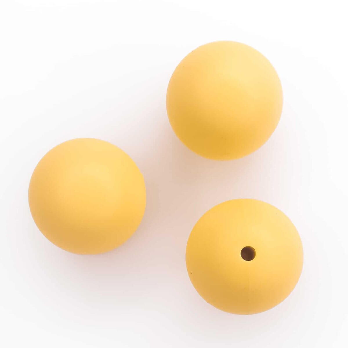 Perles de silicone rondes 19 mm jaune maïs