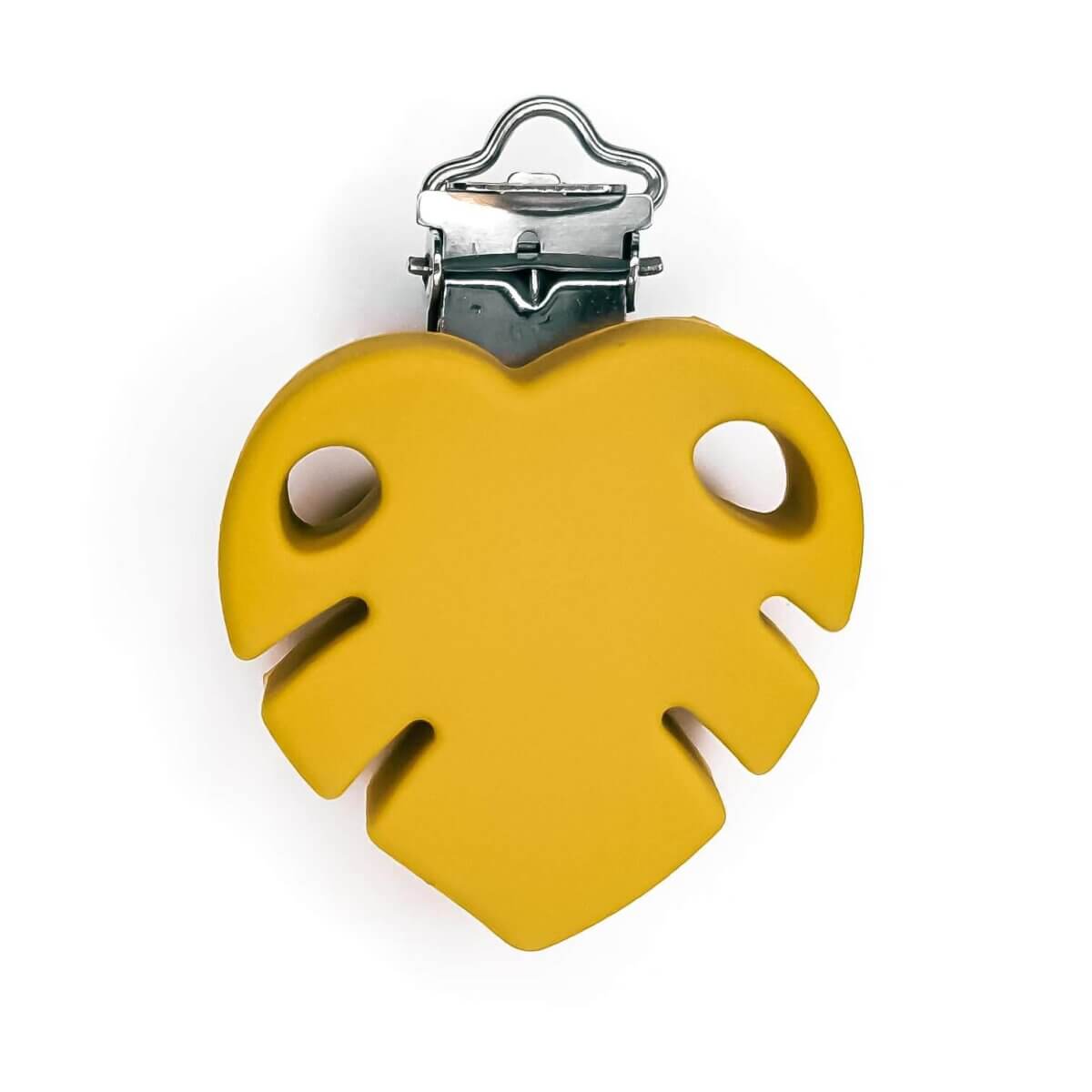 <h2>Attache-sucette en silicone - Feuille de monstera - Jaune ocre</h2>
Couleur : jaune ocre
Matériau : comme toujours, sans BPA, sans PVC, sans phtalates et autres silicones exempts de toxines.
100% sécurité enfants, certifié CE
Avec des trous conformes à la norme NEN 12586 Clip robuste avec insert en plastique. Jootjes Haakcadeautjes