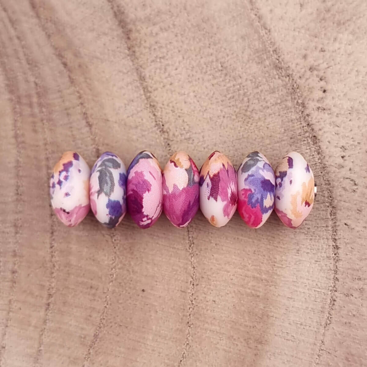 Size: 12 mm
Color Flower Festival Print Material: According to EN-71 safely tested silicone. BPA-free, Phthalate-free, PVC-free and free of all other harmful chemicals as tested through EN-71. This makes it suitable for pacifier cords and CE-certified end product such as a teething ring.   Jootjes Haakcadeautjes