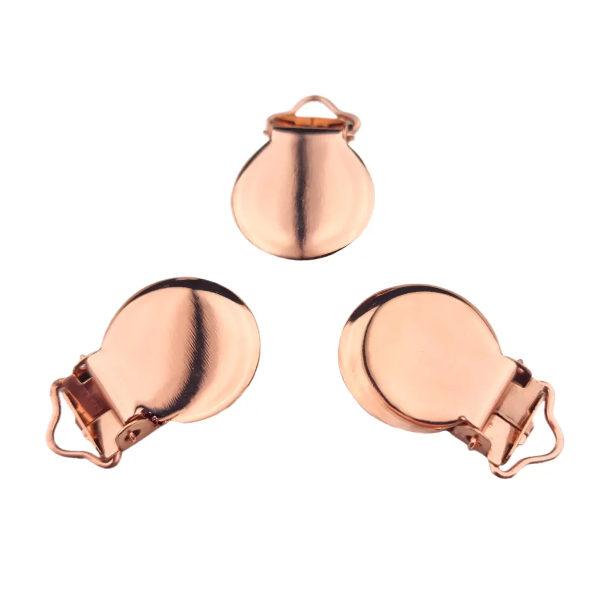 <ul> <li>Attache-sucette métal rond</li> <li>Version : métal cuivre brillant / or rose (acier inoxydable), attache étroite</li> <li>Pince à bébé qui se clipse bien</li> <li>Métal sans plomb</li>
</ul> Jootjes Haakcadeautjes