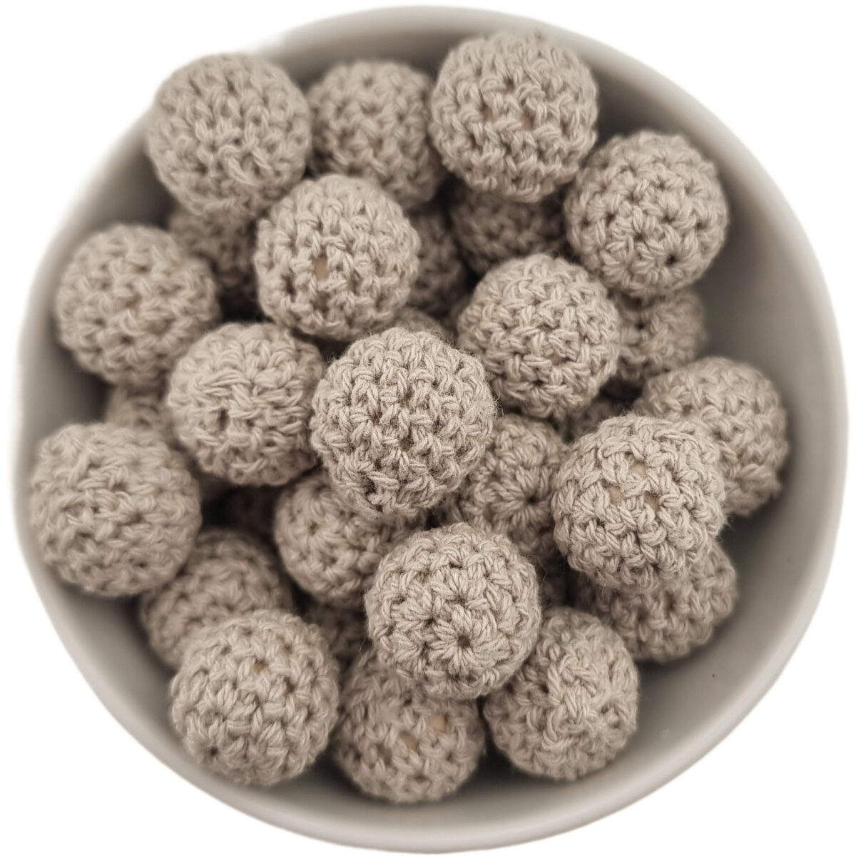 Crocheted beads; Wooden bead with crocheted baby safe cotton girth.
<ul> <li>Size: 20 mm wooden bead with cotton</li> <li>Color code: Eggshell</li> <li>Old Color Name : Clay</li>
</ul>
Hand crocheted.
100% baby safe cotton yarn. Jootjes Haakcadeautjes