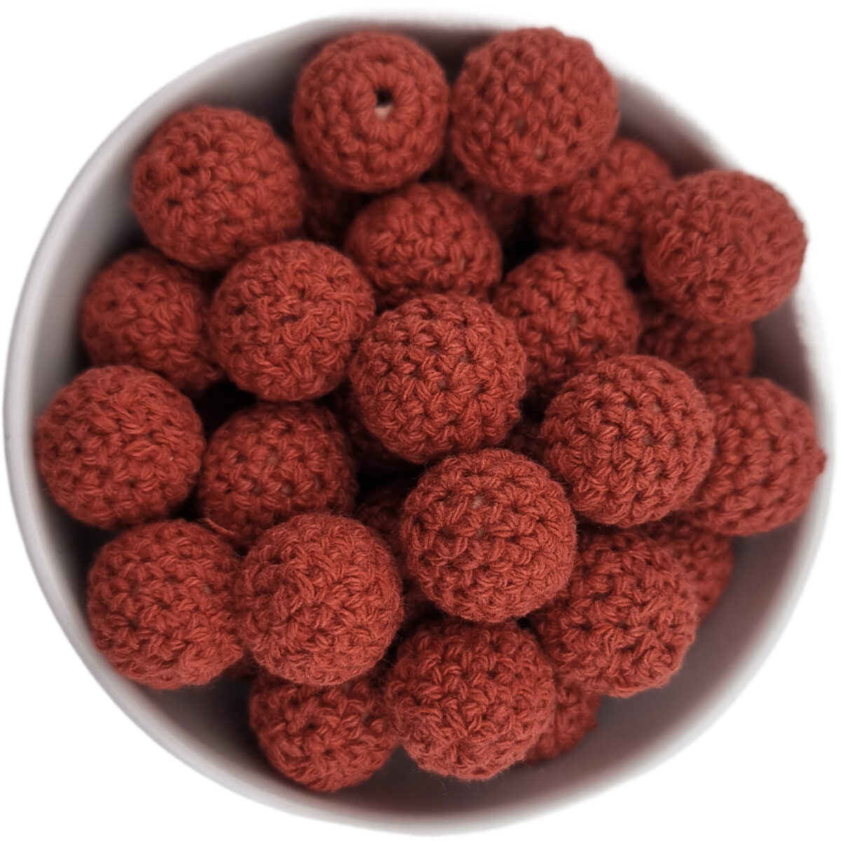 Crocheted beads; Wooden bead with crocheted baby safe cotton girth.
<ul> <li>Size: 16 mm wooden bead with cotton</li> <li>Color code: Rust Red</li>
</ul>
Hand crocheted.
100% baby safe cotton yarn. Jootjes Haakcadeautjes